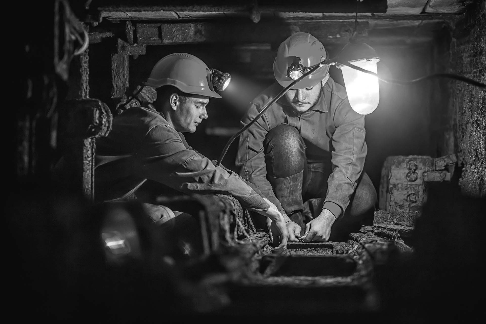 Two miners in the mine